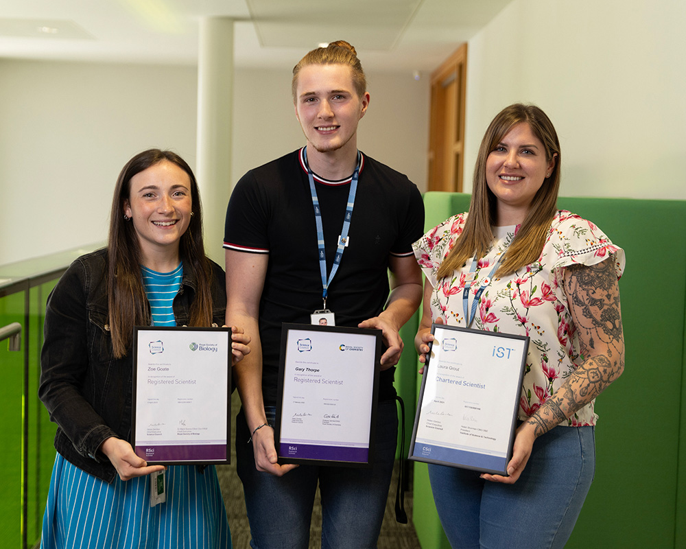 Zoe Goate, Gary Thorpe and Laura Grout with their professional registrations